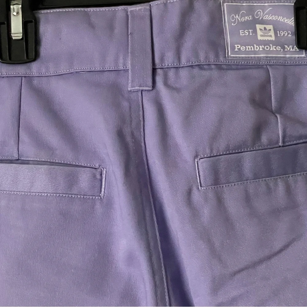 A beautiful purple tone that accentuates these wide-legged pants from Adidas. - Picture 3 of 3